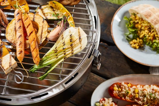 A close up of vegetables on a grill and various healthy, gourmet dishes.
