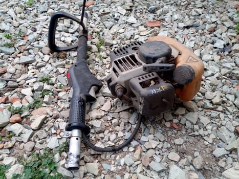Parts from broken motos. Petrol trimmer disassembled.