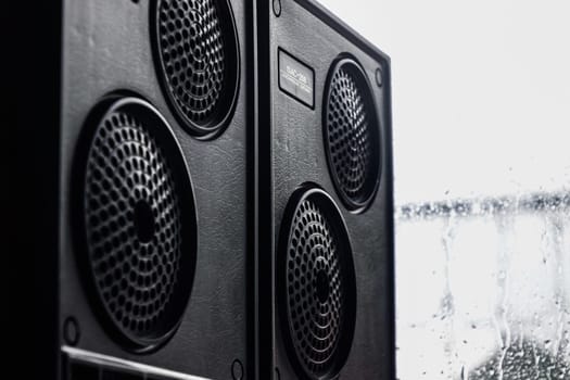Krasnodar, Russia - April 11, 2020: Vintage speakers by the window. Column speaker 15AS-208. Vintage Soviet bookshelf acoustics.