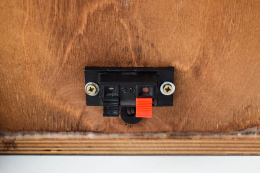 The back of the speakers. Terminals for attaching speaker wires to the speaker. Column speaker 15AS-208. Vintage Soviet bookshelf acoustics.