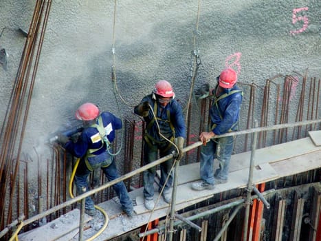 salvador, bahia / brazil - april 19, 2006: workers are seen working during construction of line 2 of the metro in the city of Salvador...