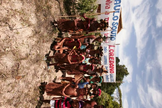 porto seguro, bahia / brazil - february 26, 2010: Pataxo Indians are seen during land occupation on Urubu Island, in the city of Porto Seguro.