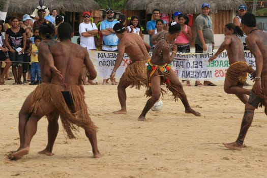 santa cruz cabralia, bahia / brazil - april 21, 2009: Ethnic Pataxo Indians are seen at a soccer match at Coroa Vermelha Village during the IX Edition of the Indian Games.