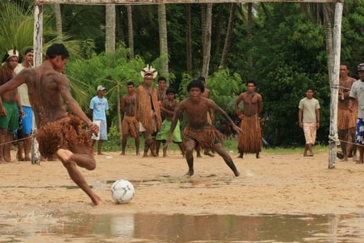 santa cruz cabralia, bahia / brazil - april 21, 2009: Ethnic Pataxo Indians are seen at a soccer match at Coroa Vermelha Village during the IX Edition of the Indian Games.