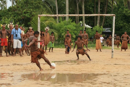 santa cruz cabralia, bahia / brazil - april 21, 2009: Ethnic Pataxo Indians are seen at a soccer match at Coroa Vermelha Village during the IX Edition of the Indian Games.