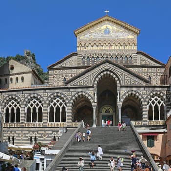 AMALFI, ITALY - JUNE 27: Apostle Saint Andrew Cathedral in Amalfi on JUNE 26, 2014. Tourists at Church Stairway in Amalfi, Italy.