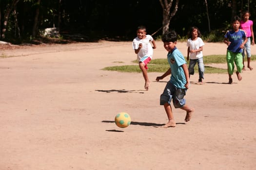 porto seguro, bahia / brazil - june 18, 2010: Pataxo Indians are seen attending an indigenous school in the Jaquira village in the city of Porto Seguro.