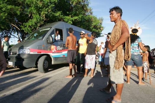 santa cruz cabralia, bahia / brazil - march 30, 2011: Pataxo Indians are seen during a demonstration on the BR 376 highway due to a strike by teachers in indigenous schools in the villages of Santa Cruz Cabralia.