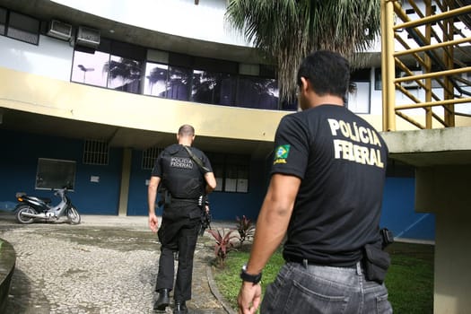 itabuna, bahia / brazil - december 13, 2011: Federal Police officers carry out search and arrest warrant at the City Council for investigation of misappropriation of funds in the city of Itabuna..