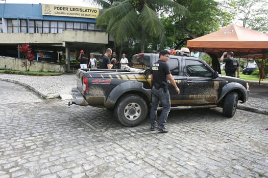 itabuna, bahia / brazil - december 13, 2011: Federal Police officers carry out search and arrest warrant at the City Council for investigation of misappropriation of funds in the city of Itabuna..