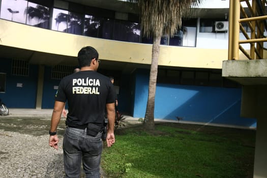 itabuna, bahia / brazil - december 13, 2011: Federal Police officers carry out search and arrest warrant at the City Council for investigation of misappropriation of funds in the city of Itabuna..