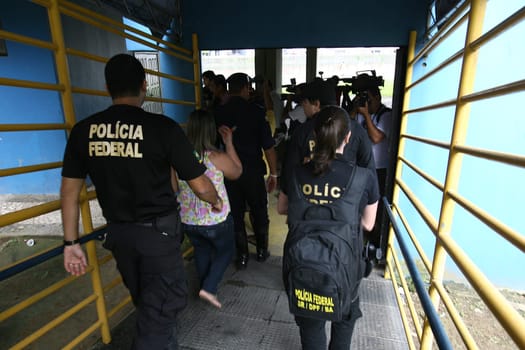 itabuna, bahia / brazil - december 13, 2011: Federal Police officers carry out search and arrest warrant at the City Council for investigation of misappropriation of funds in the city of Itabuna..