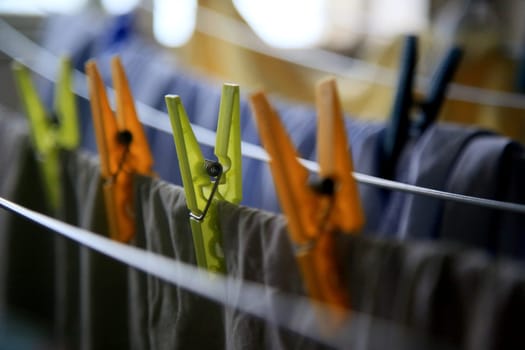 salvador, bahia / brazil - may 7, 2020: clothespins are seen in clothesline in an apartment in the city of Salvador.