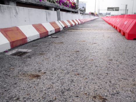 plastic road fencing on the street of a modern