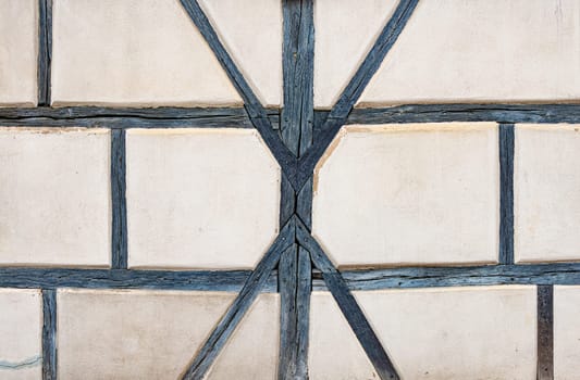 Fachwerk or timbered building wall. Traditional germany architecture in Rothenburg Ob Der Tauber city in Bavaria, Europe
