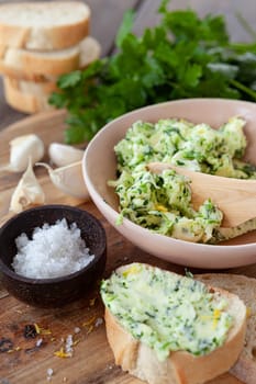 Homemade butter with fresh parsley and garlic