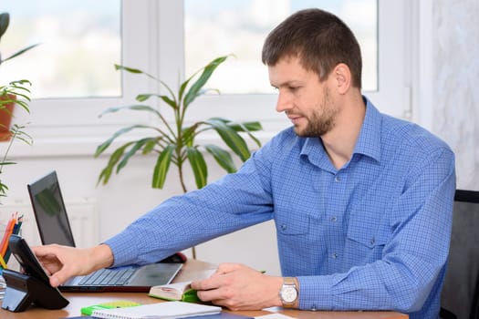 Office employee picks up the a phone