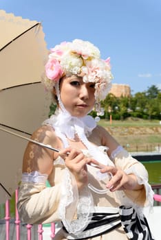 KAGAWA, JAPAN - September 28: Japanese anime character cosplay pose in Anime Event in Kagawa 2014 on Sept 28, 2014 at Reoma World Park, Marugame, Kagawa, Japan.