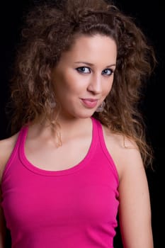 young beautiful brunette portrait against black background