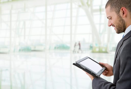 young businessman with a tablet pc at the office