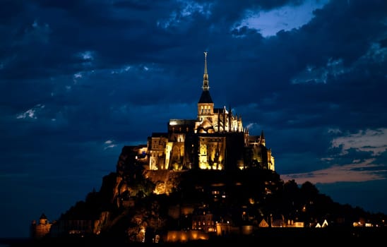mount saint michel at night, normandy, france