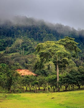 Farm house at the foot of a hill in central Costa Rica