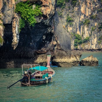 Traditional Thai boat near entrance to a lagoon in Koh Hong island in Andaman Sea