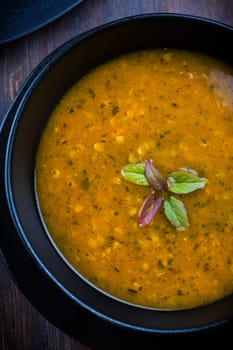 Red lentil curry soup with hot chilli and Thai basil