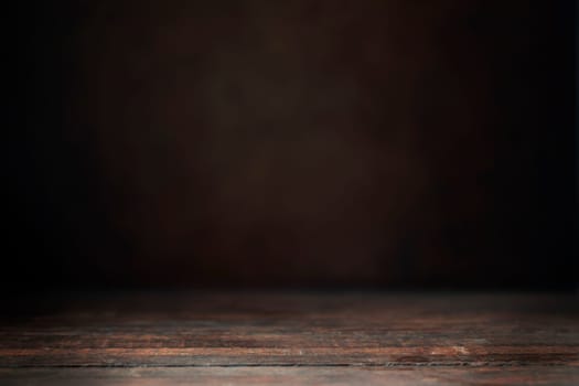 Dark wooden susrface and out of surface background to composite your product into.