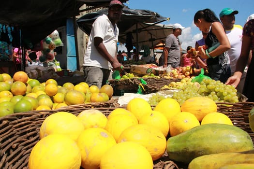conde, bahia / brazil - september 7, 2012: Melons, papayas, oranges are seen for sale at a free market in the city of Conde.