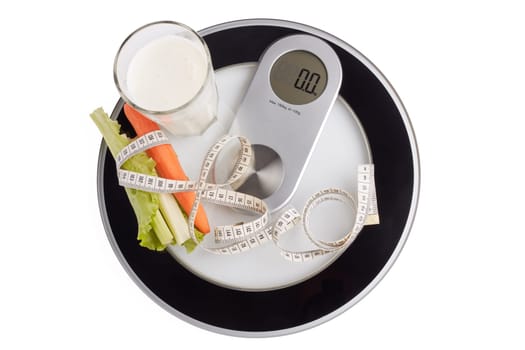 Slimming, diet, and control of weight. Still life with healthy food, scales and measuring tape. Healthy nutrition. Healthy lifestyle concept. Control of weight during the isolation period