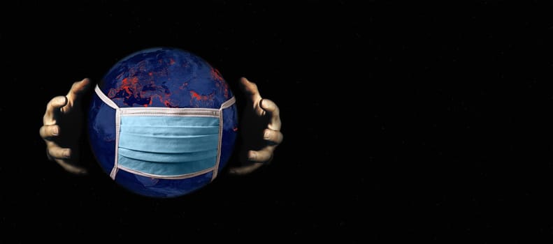 Coronavirus spreading, infecting the world. Hands grasping the planet earth with a face mask. The planet quarantined by covid 19, illustrative concept