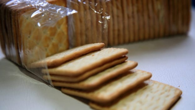 salvador, bahia / brazil - may 12, 2020: cream cracker cookies are seen outside the package.