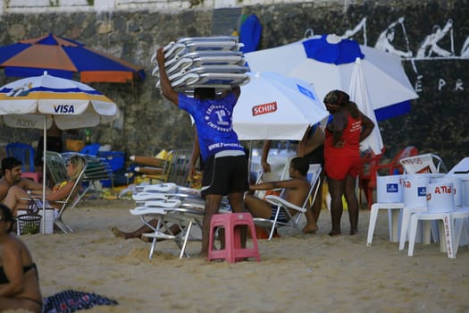 salvador, bahia / brazil - april 22, 2014: People are seen at Porto da Barra beach in Salvador city.