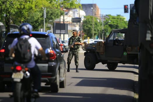 buerarema, bahia / brazil - february 14, 2014: Army soldiers patrol the streets of Buerarema City Center due to series of conflicts involving Tupinamba ethnic Indians and local farmers..