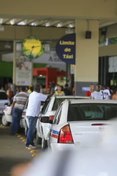 salvador, bahia / brazil - march 10, 2014: Taxi drivers are seen in a row near the Iguatemi Mall in the city of Salvador.