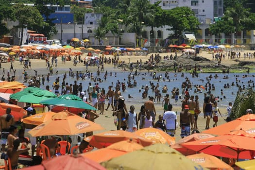 salvador, bahia / brazil - January 1, 2014: People are seen at Itapua Beach in the city of Salvador.