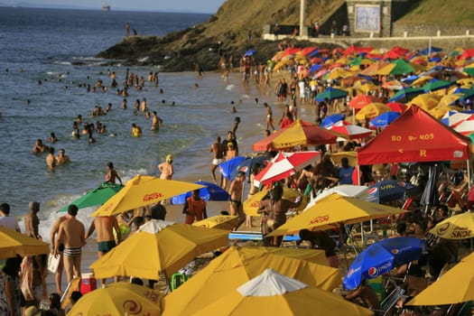 salvador, bahia / brazil - april 22, 2014: People are seen at Porto da Barra beach in Salvador city.