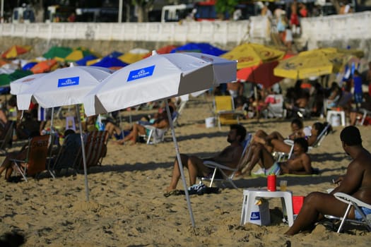 salvador, bahia / brazil - april 22, 2014: People are seen at Porto da Barra beach in Salvador city.