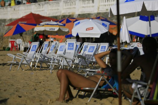 salvador, bahia / brazil - april 22, 2014: People are seen at Porto da Barra beach in Salvador city.