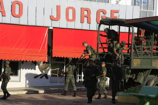 buerarema, bahia / brazil - february 14, 2014: Army soldiers patrol the streets of Buerarema City Center due to series of conflicts involving Tupinamba ethnic Indians and local farmers..