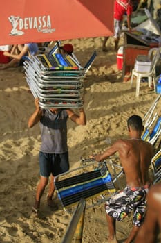 salvador, bahia / brazil - april 22, 2014: People are seen at Porto da Barra beach in Salvador city.