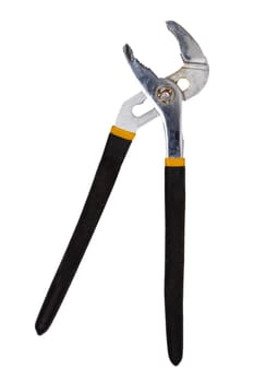 Pliers isolated. Close-up of an open metal adjustable waterpump pliers with black yellow handles isolated on a white background. Macro photograph.