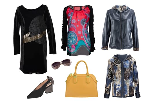 Collage woman clothes. Set of stylish and luxurious trendy women dress, sweater or blouse, jackets, shoes, handbag and accessories isolated on a white background.