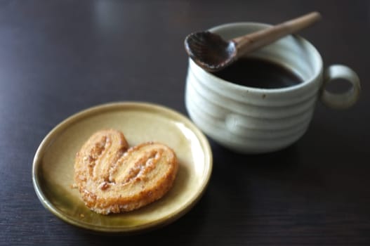 Cookies in the form of heart with coffee . Copy text menu food background.