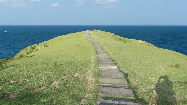 The hill with small road go to the sea with nice view
