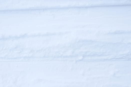 Ski run traces background. Snow skiing track surface. Ski trail texture.