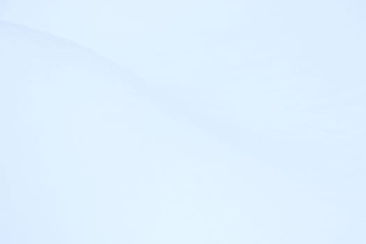 Winter snowdrift landscape background. Soft snow hills surface. Snowy mound texture.