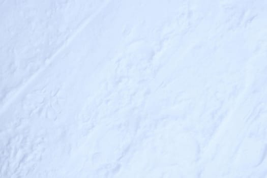 Ski trail texture. Ski run traces background. Snow skiing track surface.