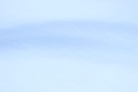 Winter snowdrift landscape background. Soft snow hills surface. Snowy mound texture.